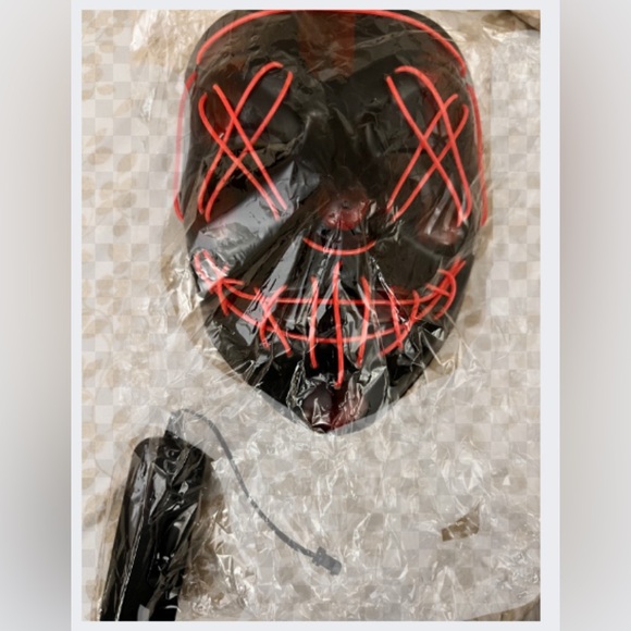 Brand new in sealed package. Purge red Halloween light up mask. - Picture 1 of 2